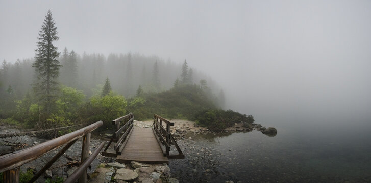 Crossing a mountain river in the fog, mountain landscapes.
