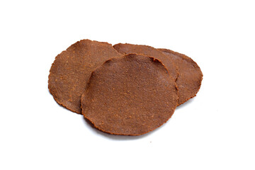 Fermented soybean discs, known as “Thua Nao,” a traditional Thai seasoning used to enhance flavor in Northern cuisine.