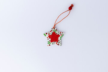 Festive Christmas decorations on a white background. Holiday concept ideal for New Year, winter celebrations, greeting cards, and seasonal design projects.