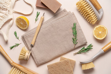 Zero waste home cleaning supplies, lemon and rosemary for making sustainable cleaning essentials on...