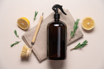 Eco-friendly cleaning product with lemon and rosemary on beige background with copy space. Zero...