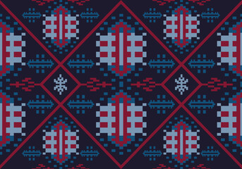 seamless sophisticated dark-hued pixel pattern using navy, red, and icy blue tones. It features shield-like motifs and aquatic shapes, arranged within structured red diamond frames for a regal effect.