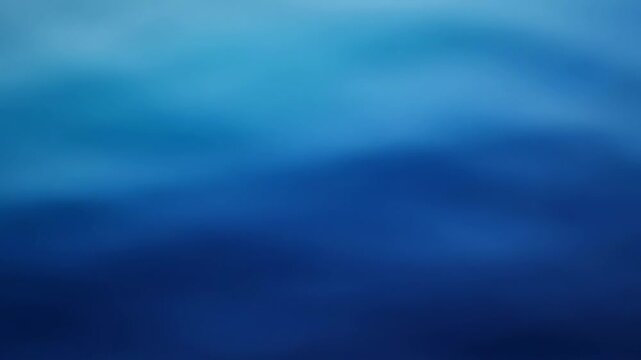 Blue gradient background shifting from lighter to darker shades