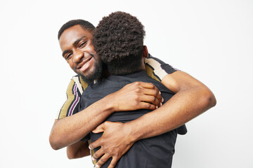 Warm embrace between a black man and a child, showcasing love and connection, evoking feelings of...