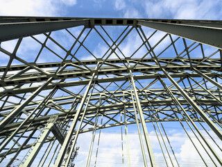 Geometric Steel Bridge Structure over Blue Sky in Germany