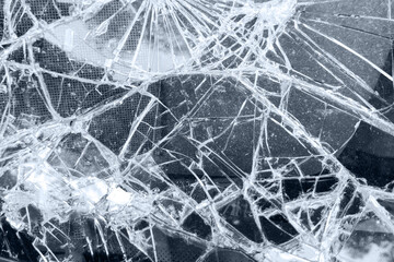 Cracks on broken glass. Gray color.