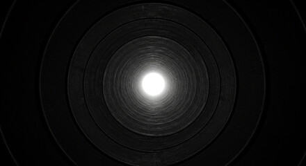 Abstract Dark Tunnel with Light at the End creating a Visual Metaphor for Hope, Opportunity and the End of a Difficult Journey Ahead