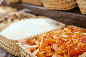 Dried fruit on sale at outdoor farmer market. The fruit shrinks during this process, leaving a small, energy-dense dried fruit. Organic produce. Close up. Part of the series