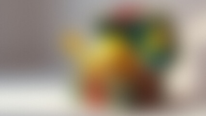 Abstract gradient of warm colors with a textured grainy effect