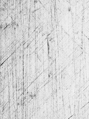 Abstract texture with scratched lines on a white surface creating a unique visual appearance