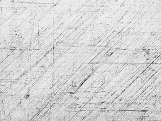 Texture of worn wooden surface showing scratches and marks from extensive use over time,...
