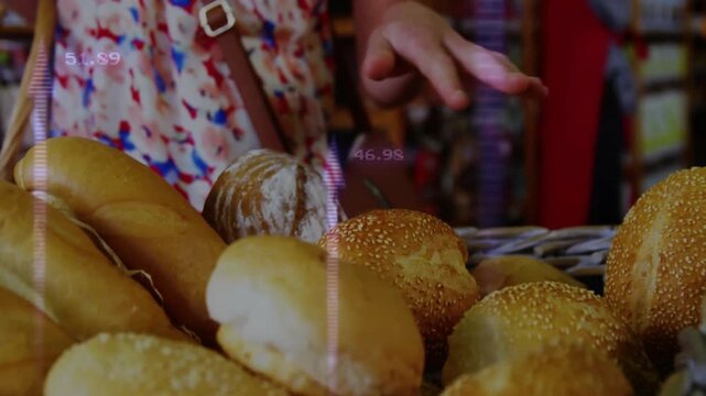 Entering behind bread basket, shopper picking roll, inspecting, placing in basket showing choice