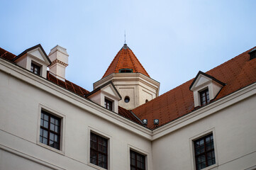 Obraz premium Bratislava Castle is massive rectangular building with four corner towers stands on an isolated rocky hill of the Little Carpathians in Bratislava