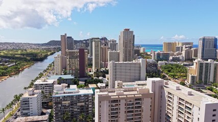 Honolulu, Hawaii USA, Drone View of Ala Wai Canal, Condominium aad Hotel Buildings in Waikiki Neighborhood