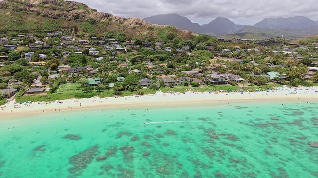 Aerial View of Lanikai Beach, Popular Spot on Oahu Island, Hawaii USA, White Sand, Turquoise Ocean and Green Landscape
