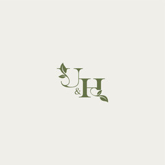 luxury wedding monogram design UH bold initial concept letter organic leaf logo