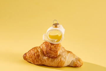 Holiday Croissant with Butter Christmas Ornament on Yellow