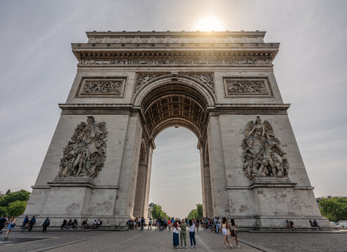View of the front of the Arc de Triomphe in Paris.
