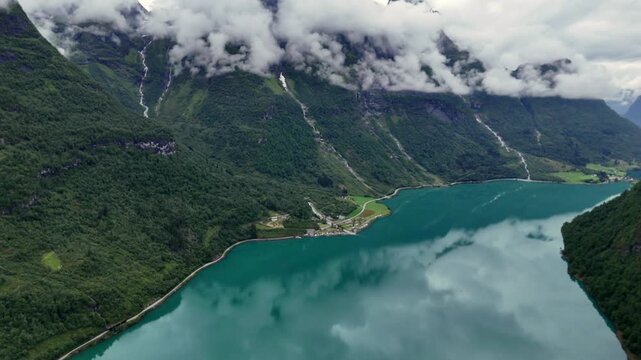 Aerial view of the calm lake Oldevatnet framed by steep mountainsides