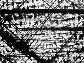 Abstract pattern of black and white lines creating an intricate design on a textured surface during...