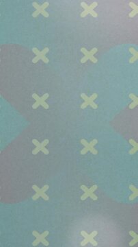 Animation of green crosses over green background