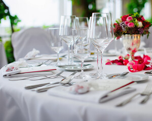 An elegantly decorated banquet table at an event. Wedding decoration.