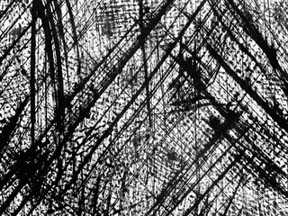 Abstract black and white composition featuring intense linear patterns and textures created with...
