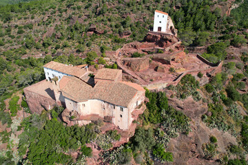 Drone view of Mare de Déu de la Roca de Mont-roig hermitage on sunny day. Mont-roig, Tarragona,...