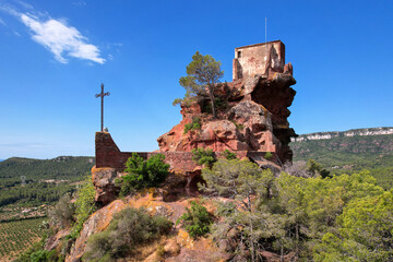 View of Mare de Déu de la Roca de Mont-roig hermitage on sunny day. Mont-roig, Tarragona, Spain.