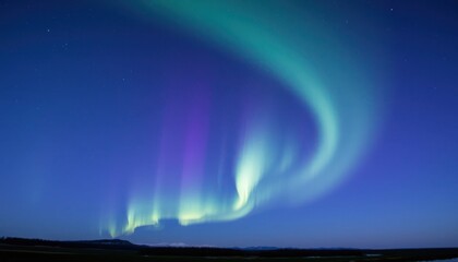 Naklejka premium Spectacular Aurora Borealis Displaying Vibrant Colors in the Night Sky