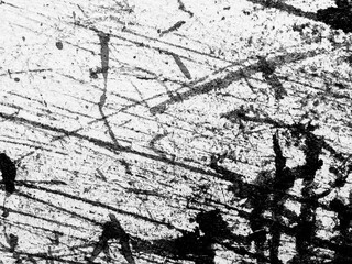 Abstract monochrome texture with scratches and lines exposing a dynamic surface