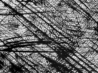 Black and white abstract artwork featuring dynamic lines and textures created through bold brush...
