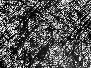 Intricate abstract patterns of lines and textures created using black ink on a textured surface during an artistic exploration