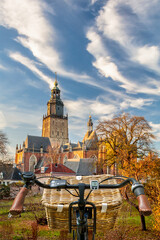 Electric bicycle in front of the medieval city center of the Dutch town Zutphen