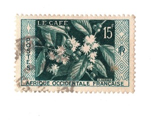 A vintage postage stamp from French West Africa isolated on a white background.