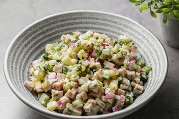 cold Russian soup okroshka with egg and vegetables