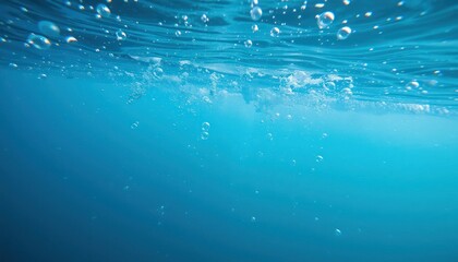 Obraz premium Underwater scene with bubbles and blue water, perfect for backgrounds