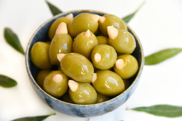 These Greek green olives are stuffed with crunchy almonds, blending salty and nutty flavors in one bite. A delicious, healthy snack or elegant appetizer straight from the Mediterranean.