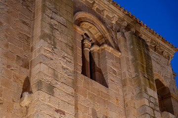 Historic architecture illuminated at dusk in Zamora, Castilla y Leon, showcasing intricate stonework and design features