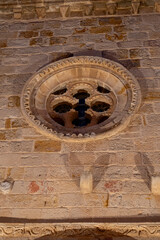 Intricate stone details of a historical building in Zamora, Castilla y Leon at twilight highlighting architectural beauty