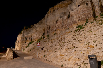 Nighttime view of rocky cliffs and roadway in Zamora, Castilla y Le&oacute;n, Spain