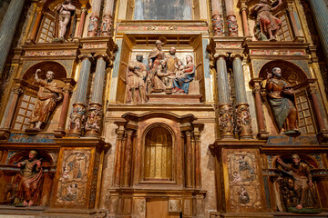 Elaborate altar of Colegiata de Santa Maria la Mayor de Toro in Zamora, showcasing intricate sculptures and religious art