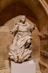Obraz premium Sculpture of Virgin Mary at Colegiata de Santa Maria la Mayor de Toro in Zamora, Castilla y Leon showcases religious artistry