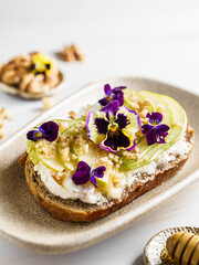 bruschetta with cottage cheese, pear, walnut and honey