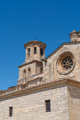 Fototapeta premium Colegiata de Santa Maria la Mayor de Toro, a historic church in Toro, Zamora under a clear blue sky