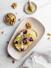 bruschetta with cottage cheese, pear, walnut and honey