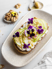 bruschetta with cottage cheese, pear, walnut and honey