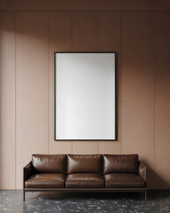 Brown leather sofa with blank framed picture on a peach wall couch furniture