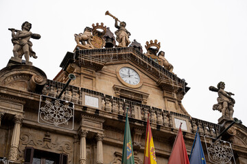 Architectural details of the city hall in Pamplona Navarra España showcasing intricate sculptures...