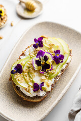 bruschetta with cottage cheese, pear, walnut and honey